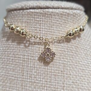 Elegant Gold and Pink Pendant Bracelet